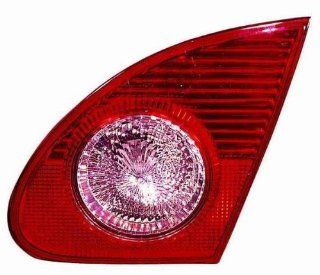 OE Replacement Toyota Corolla Passenger Side Back Up Light Assembly (Partslink Number TO2883103): Automotive