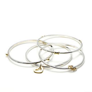 silver and 9ct gold love bangle by argent of london