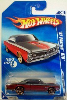 Hot Wheels 2010 134 Red/Grey '67 Pontiac GTO Faster Than Ever 1:64 Scale: Toys & Games