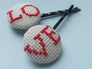 set of two cross stitch love hair grips by magasin