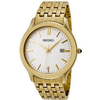 Seiko Men's SKK704 Ivory Dial Gold Tone Stainless Steel Watch: Watches