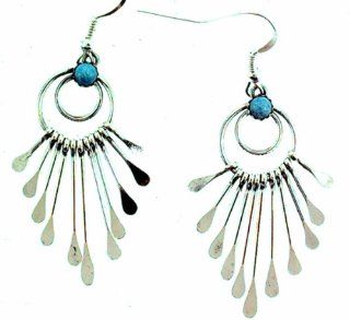 By Navajo Artist Paulene Armstrong: Sterling silver contemporary earrings made with a 4MM Turquoise stone and eleven Silver paddles: Dangle Earrings: Jewelry