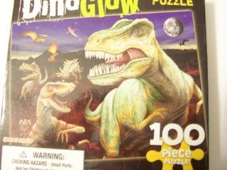 DinoGlow Puzzle ~ A 100 Piece Dinosaur Glow In The Dark Puzzle: Toys & Games