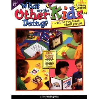 What Are the Other Kids Doing (0030554033452): Donna Marriott: Books