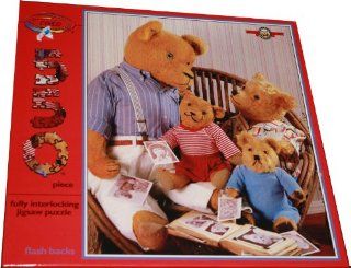 ceaco 550 Piece Puzzle   Bialosky & Friends   Flash Backs   Features The Bears Looking Through and Old Family Photograph Album While Sitting on a Wicker Chair: Toys & Games