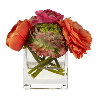 Orange flowers in a glass vase