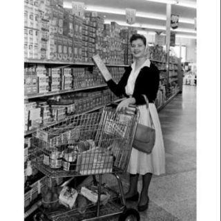 Woman doing shopping in supermarket Poster Print (18 x 24)