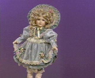 Victoria 19 inch Musical Porcelain Doll by Seymour Mann —